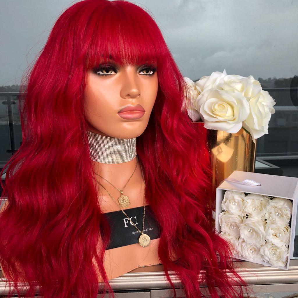 A big wavy red wig